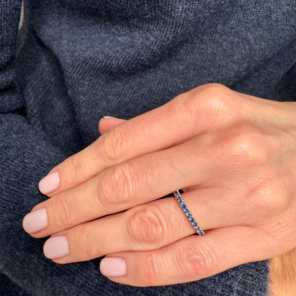 ETERNITY RING WITH BLUE SAPPHIRES