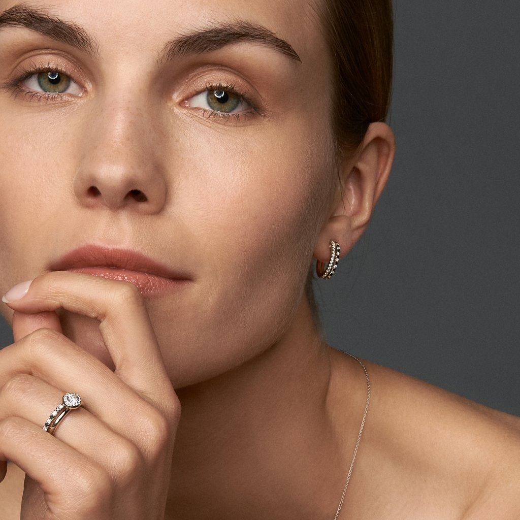 Earrings with white and black diamonds